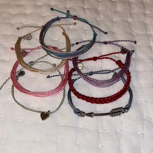7 Pura Vida bracelets.